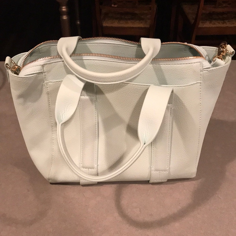 Like New a new day light aqua purse